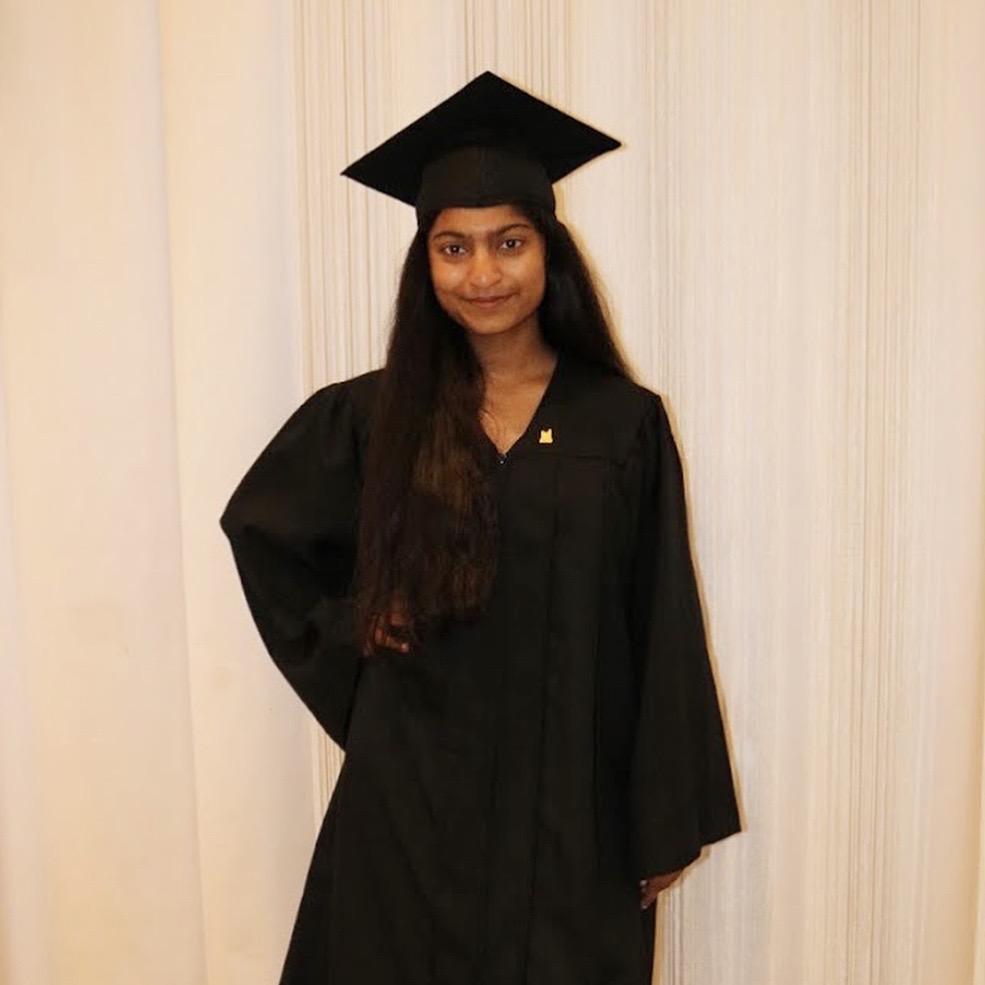 Ravicha in graduation cap and gown